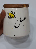 عسلی خوری سرامیکی با درب چوبی و جای قاشق